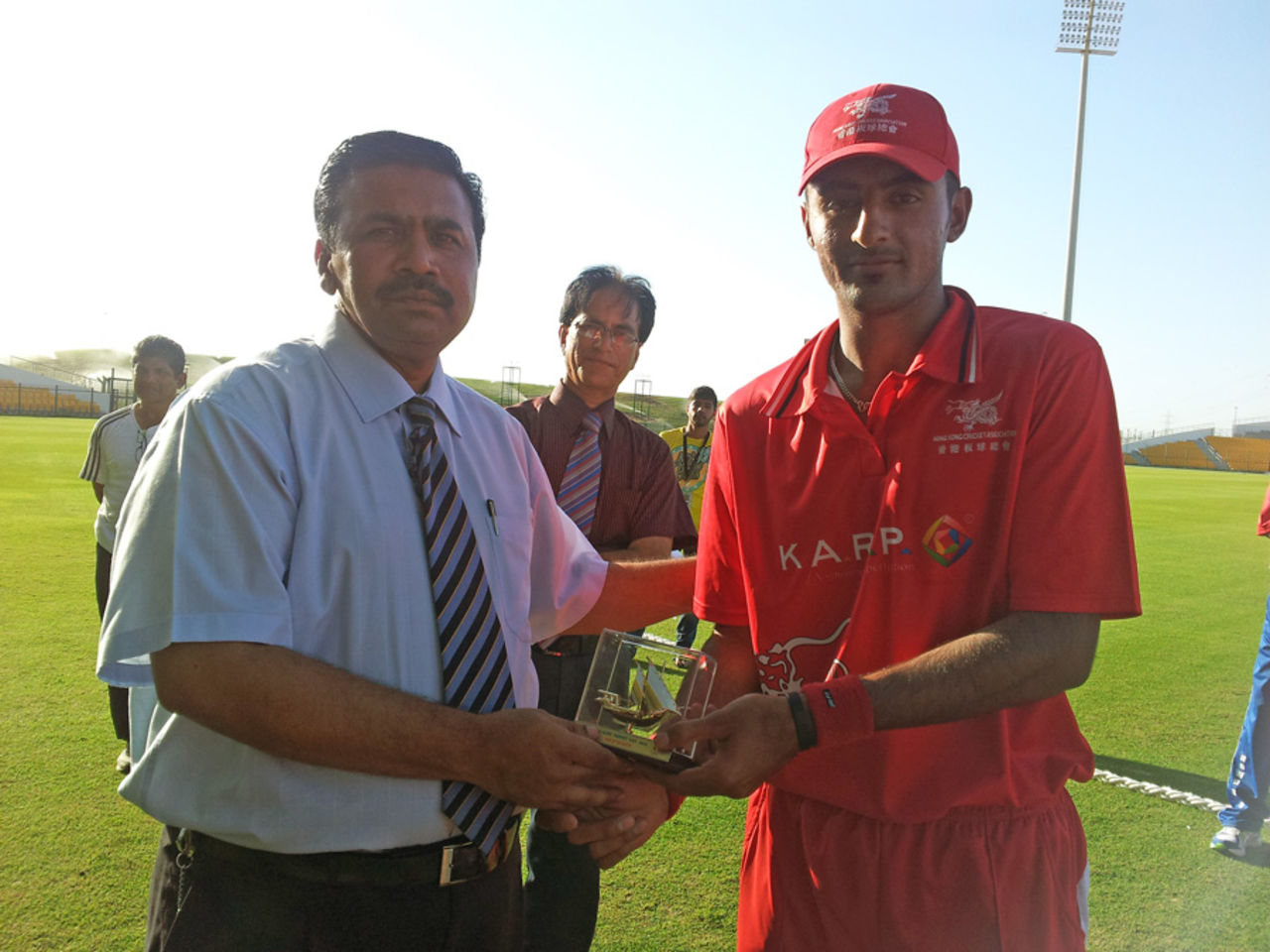 Hong Kong's Nizakat Khan receives his second Man of the Match award after scoring 33 and claiming 3-35 against Kuwait at the ACC Trophy Elite 2012 in Abu Dhabi