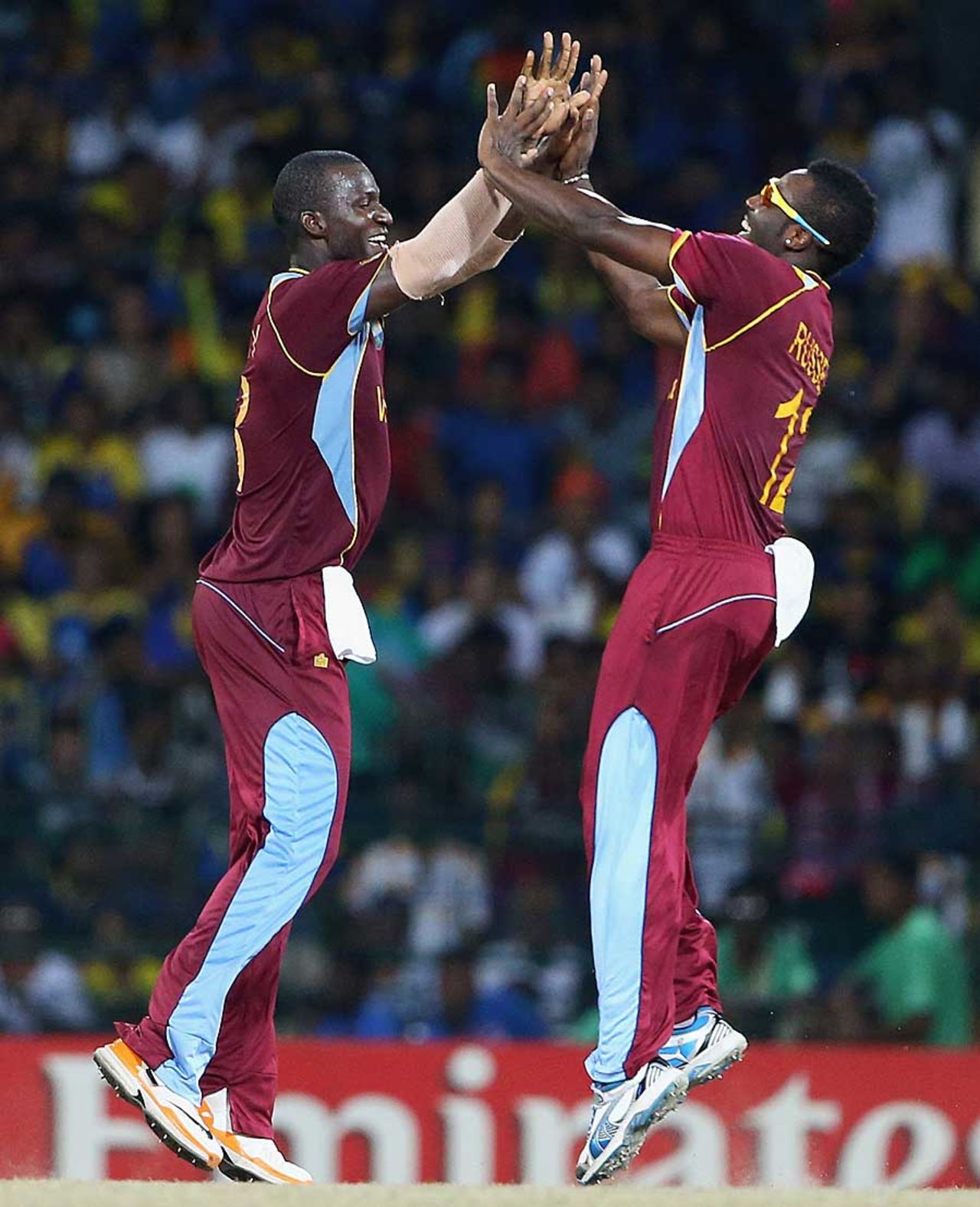 Darren Sammy and Andre Russell celebrate a wicket, Sri Lanka v West Indies, final, World Twenty20, Colombo, October 7, 2012