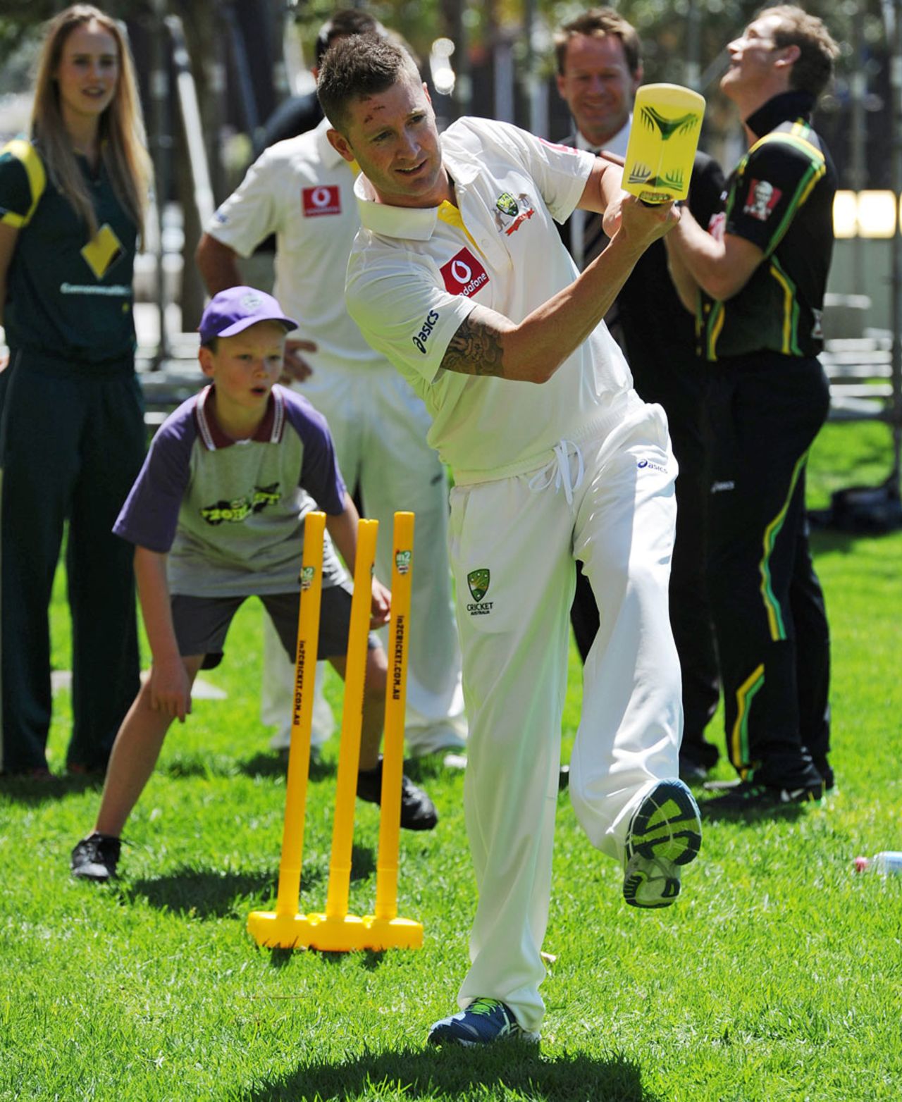 Michael Clarke with some junior cricketers at the launch of Australia's cricket season, Sydney, October 15, 2012