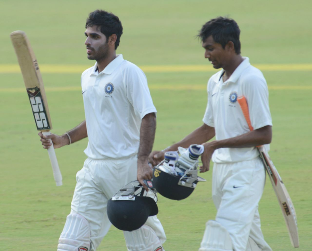 Bhuvneshwar Kumar and Rituraj Singh walk back at stumps after an unbeaten 100-run stand, Central Zone v North Zone, Duleep Trophy, semi-final, Hyderabad, 3rd day, October 16, 2012