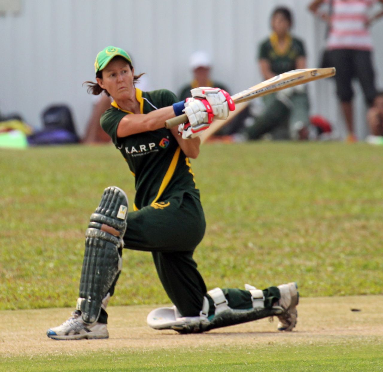 Pakistan Association's Neisha Pratt sweeps a ball to leg during the Women's T20 Cup final against HKCC Willow Wielders at Mission Road on 14th October 2012