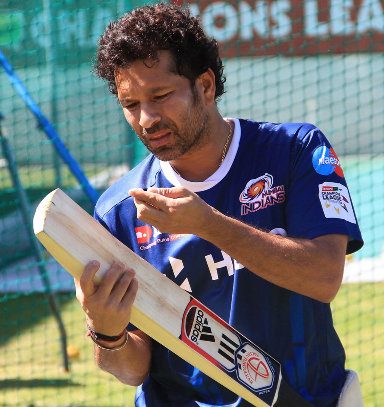 Sachin Tendulkar inspects his bat during training, Champions League T20, Cape Town, October 17, 2012