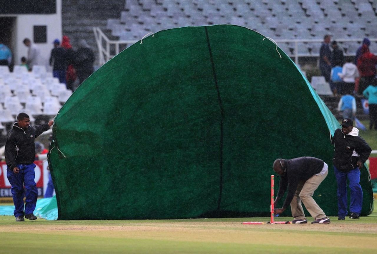 Ground staff cover the pitch at Newlands, Mumbai Indians v Yorkshire, Group B, Champions League T20, Cape Town, October 18, 2012