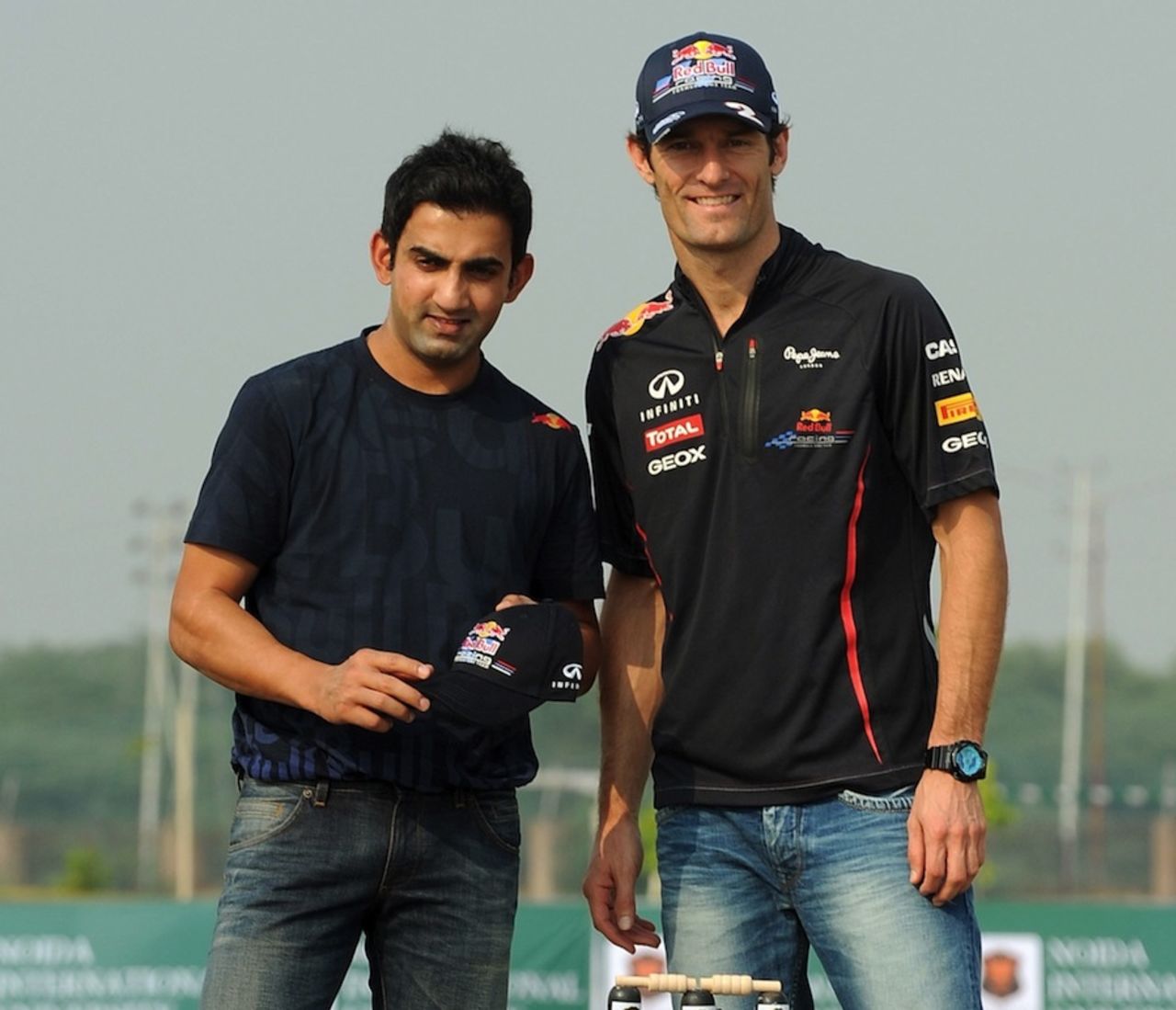 Gautam Gambhir and F1 driver Mark Webber during a promotional event, Delhi, October 24, 2012