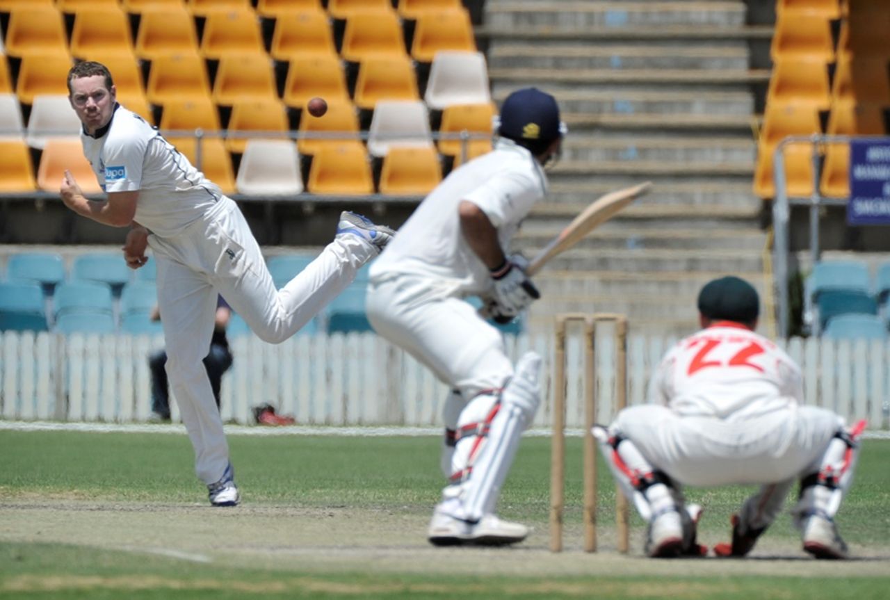 Jon Holland sends down a delivery, Cricket Australia Chairman's XI v Indians, Canberra, 2nd day, December 20, 2011