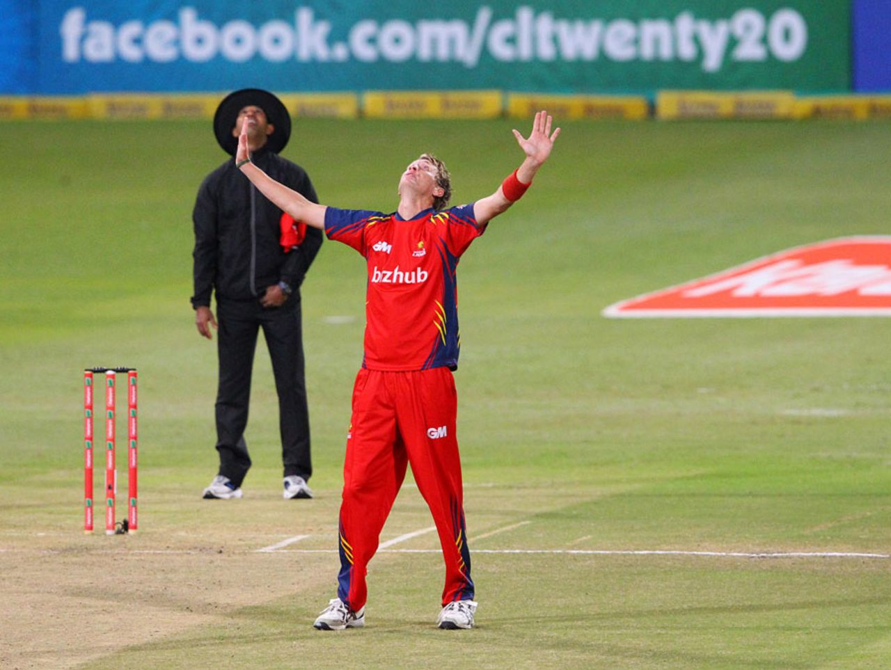 Chris Morris sets himself to take David Warner's return-catch, Delhi Daredevils v Lions, 1st semi-final, Champions League T20, Durban, October 25, 2012