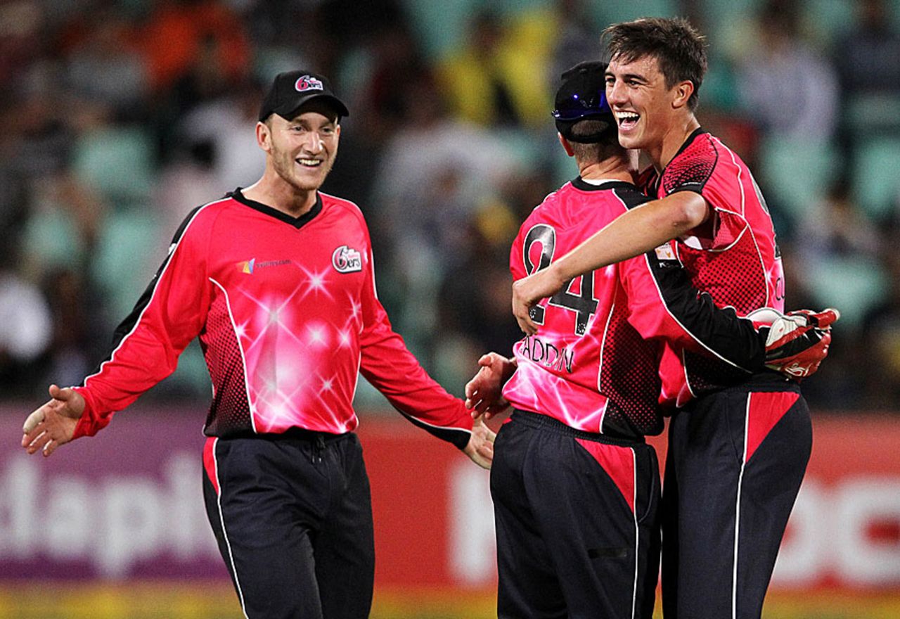 Pat Cummins is congratulated on a wicket, Mumbai Indians v Sydney Sixers, Champions League T20, Durban, October 22, 2012
