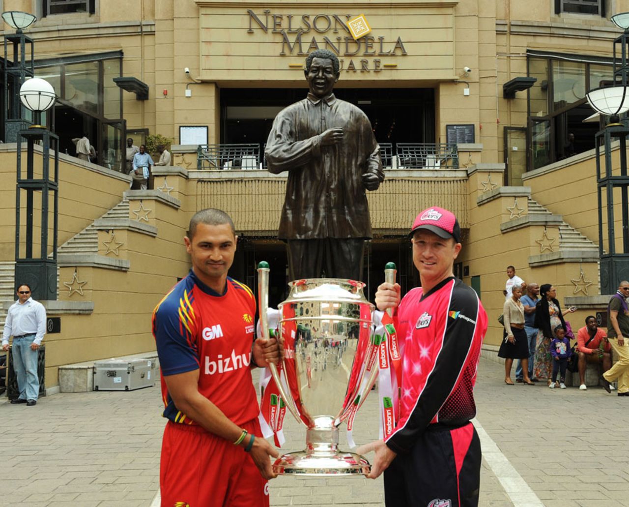Alviro Petersen and Brad Haddin pose with the CLT20 trophy ahead of the final, Lions v Sydney Sixers, final, CLT20, Johannesburg, October 28, 2012