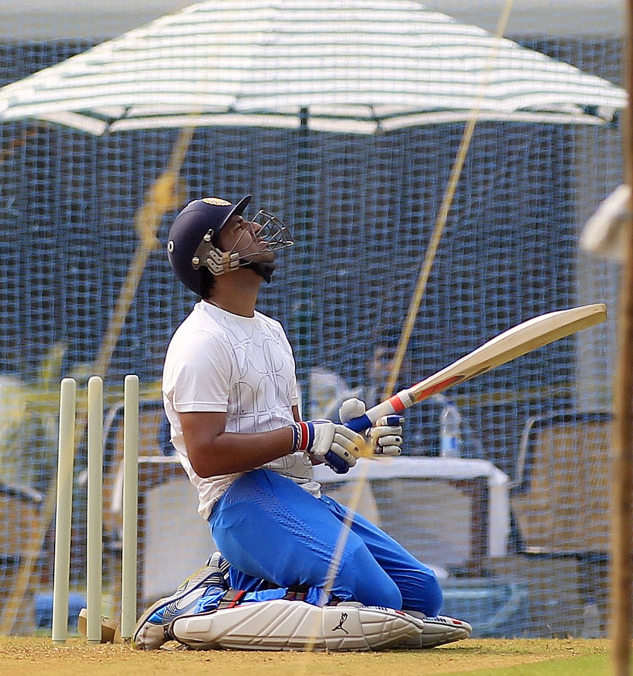 Yuvraj Singh sits during batting practice, Mumbai, October 29, 2012