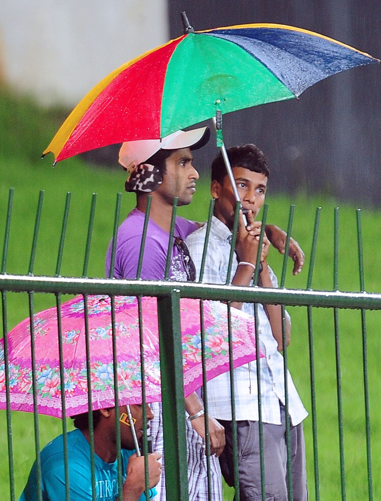 Fans wait in the rain, Sri Lanka v New Zealand, Twenty20 international, Pallekele, October 30, 2012