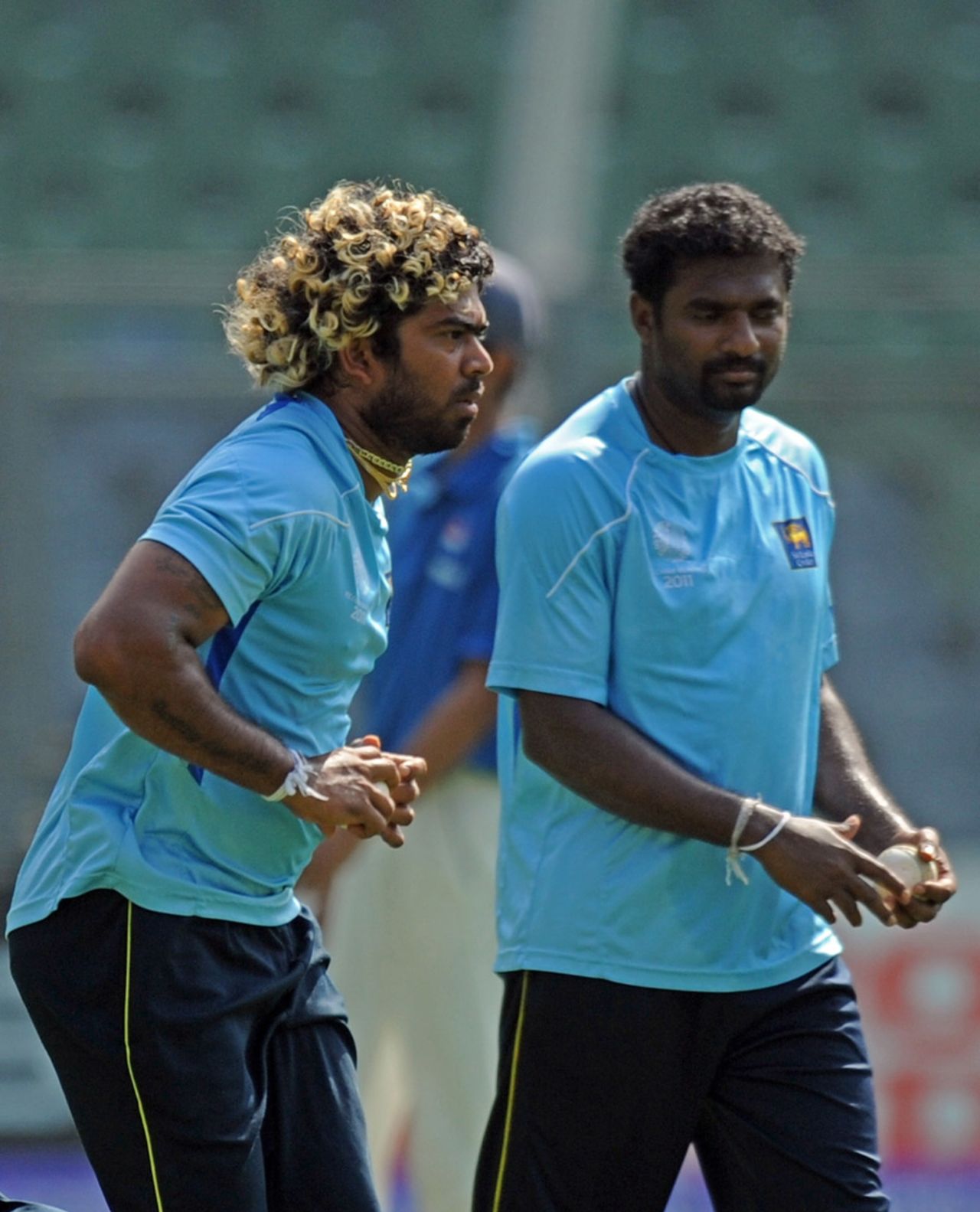Lasith Malinga and Muttiah Muralitharan at practice, World Cup, Wankhede Stadium, Mumbai  April 1, 2011