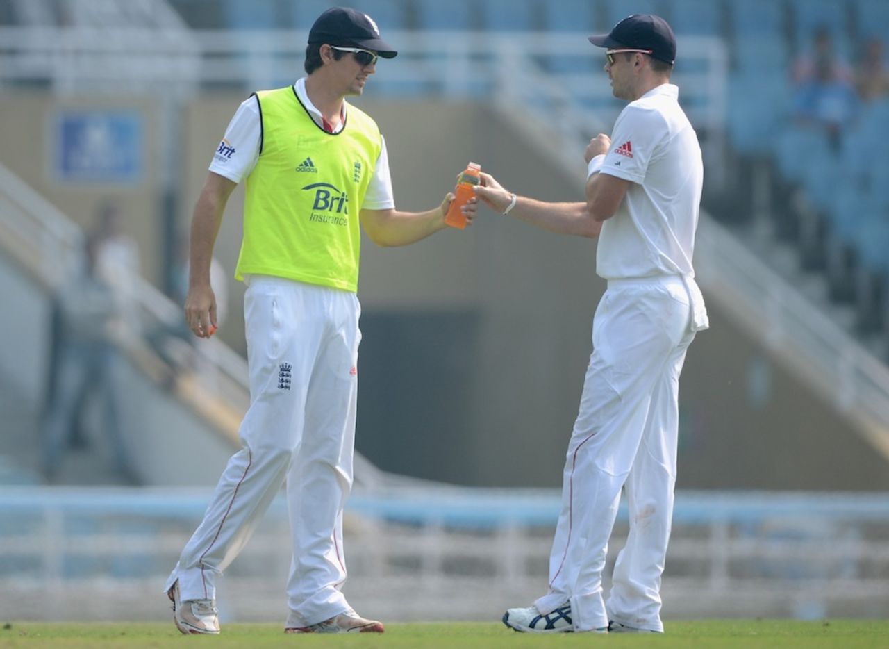 Alastair Cook brings James Anderson a drink, Mumbai A v England XI, 2nd day, Mumbai, November 4, 2012