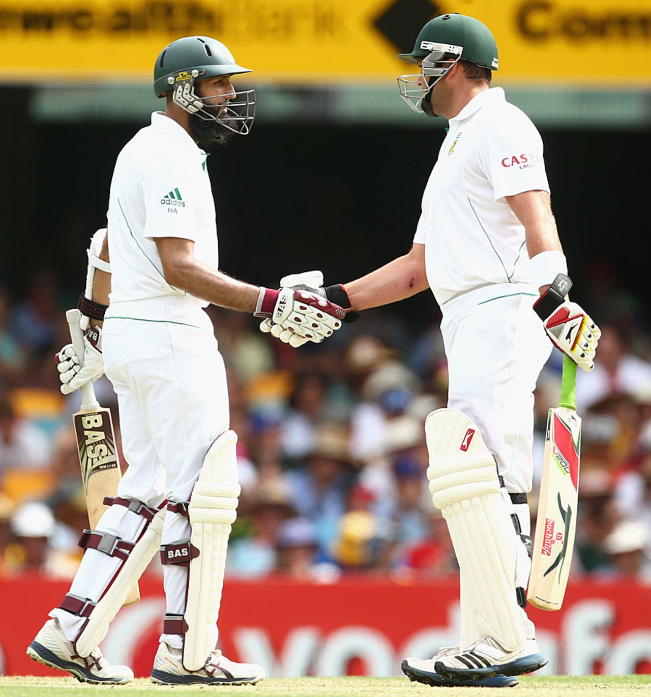 Jacques Kallis shakes hands with Hashim Amla for passing fifty, Australia v South Africa, 1st Test, Brisbane, 1st day, November 9, 2012