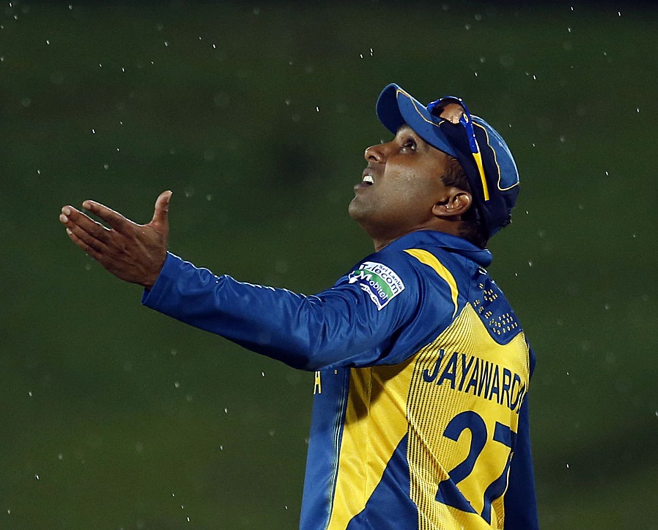 Mahela Jayawardene gauges the rain, Sri Lanka v New Zealand, 4th ODI, Hambantota, November 10, 2012