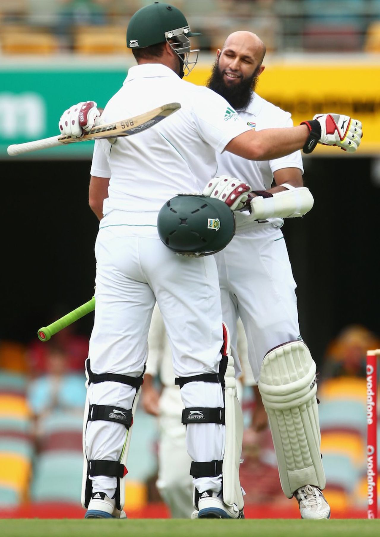 Jacques Kallis hugs the centurion Hashim Amla, Australia v South Africa, 1st Test, Brisbane, 3rd day, November 11, 2012