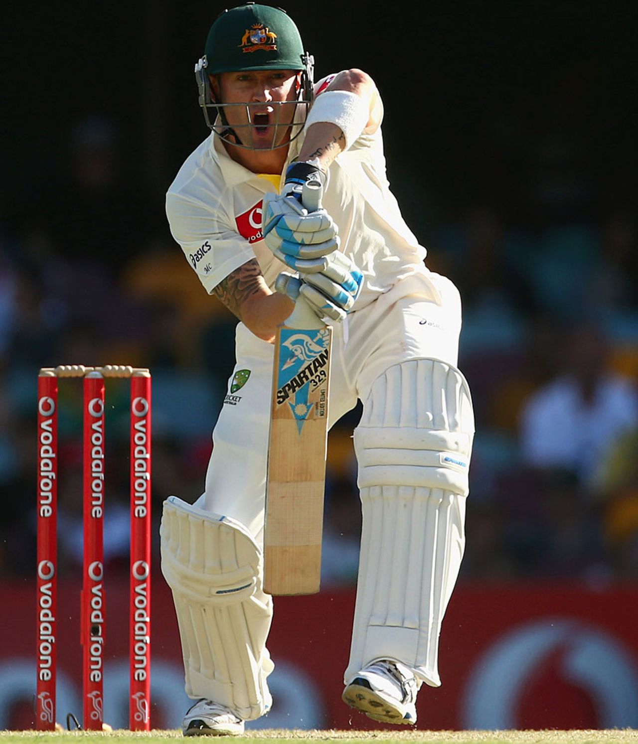 Michael Clarke calls out loud after playing a defensive shot, Australia v South Africa, 1st Test, 3rd day, Brisbane, November 11, 2012