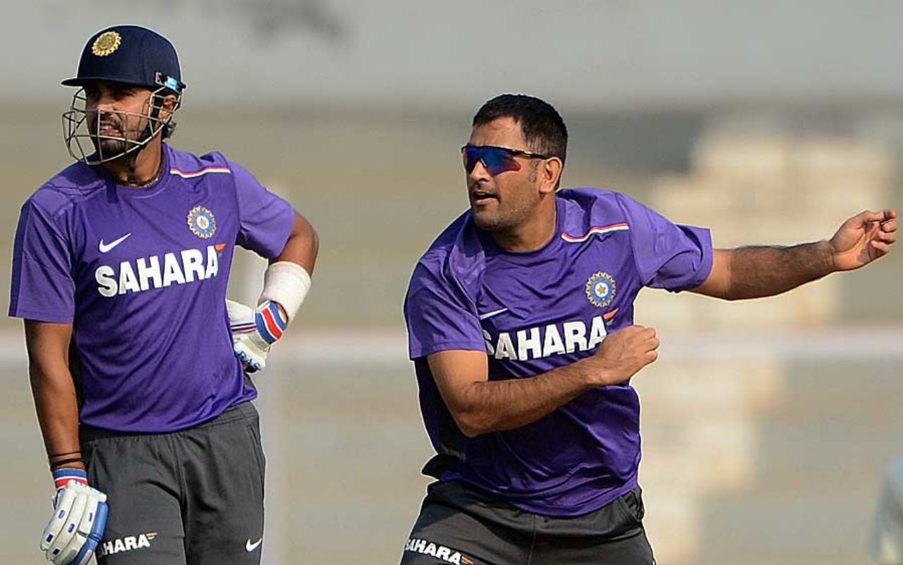 M Vijay watches MS Dhoni bowl during India's preparatory camp ahead of the Test series against England, Mumbai, November 11, 2012