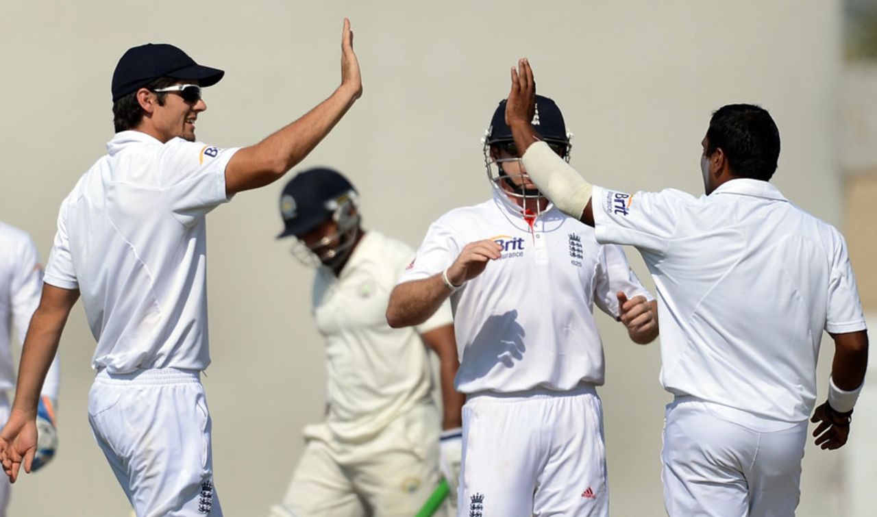 Alastair Cook congratulates Samit Patel on taking a wicket, Haryana v England XI, Ahmedabad, 4th day, November 11, 2012