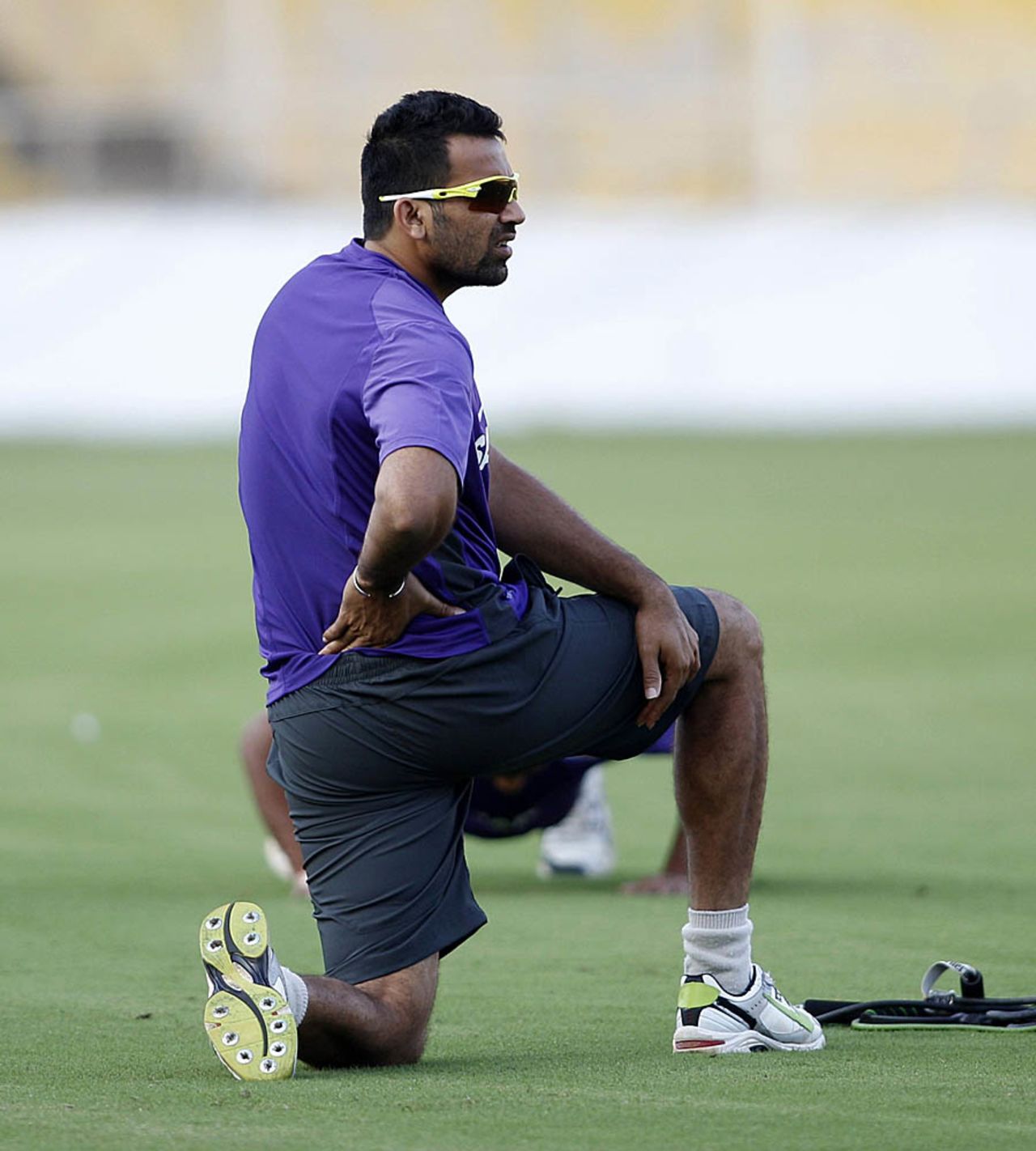 Zaheer Khan stretched during practice, Ahmedabad, November 12, 2012