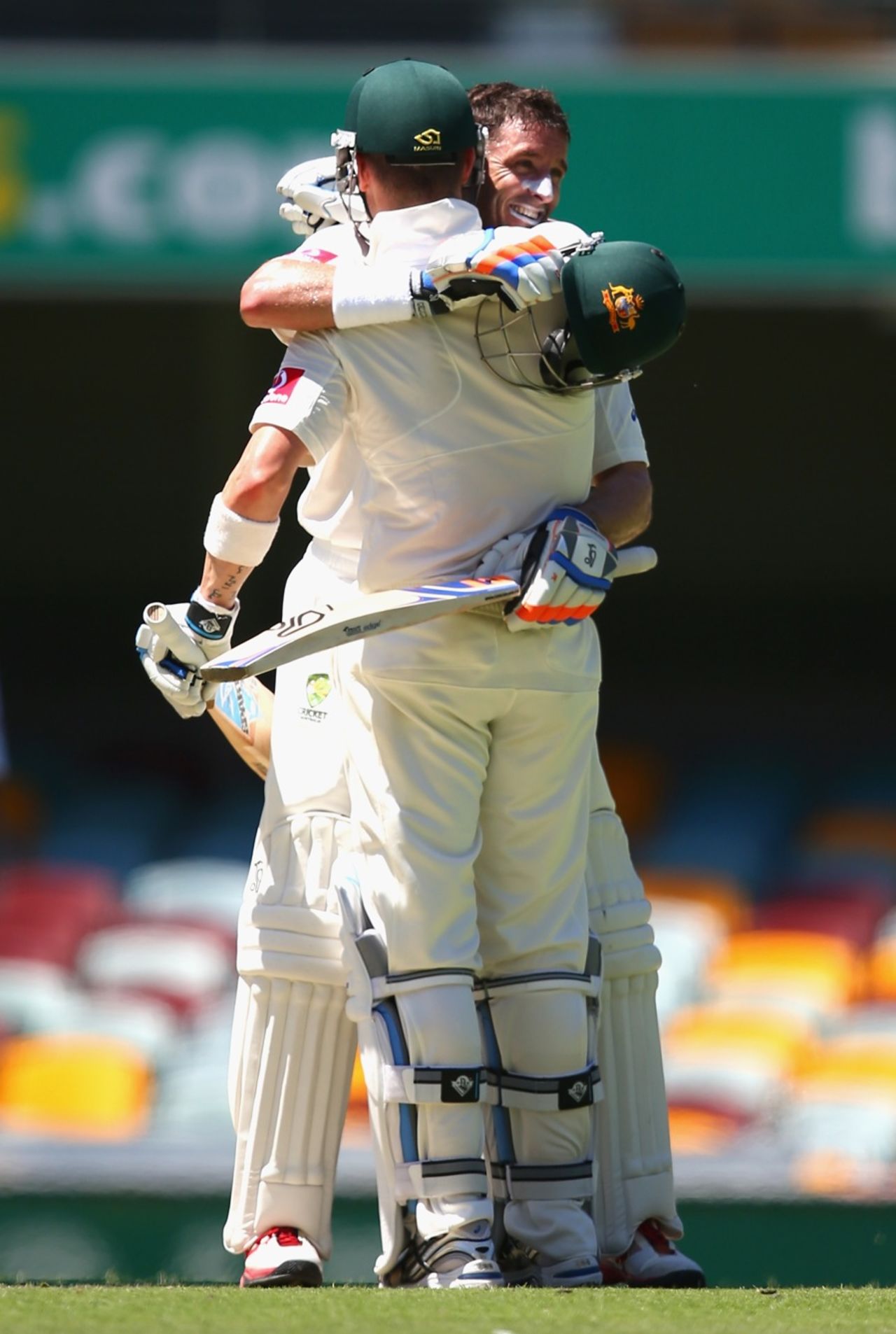Michael Hussey is congratulated on his hundred by Michael Clarke, Australia v South Africa, first Test, day five, Brisbane, November 13, 2012