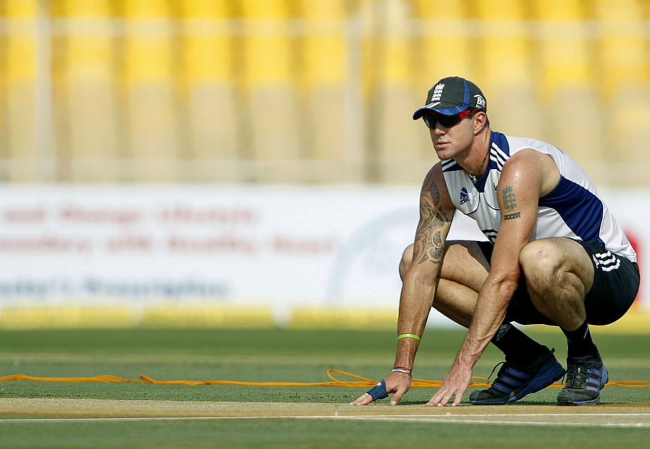 Kevin Pietersen inspects the pitch ahead of the Ahmedabad  Test, November 14, 2012