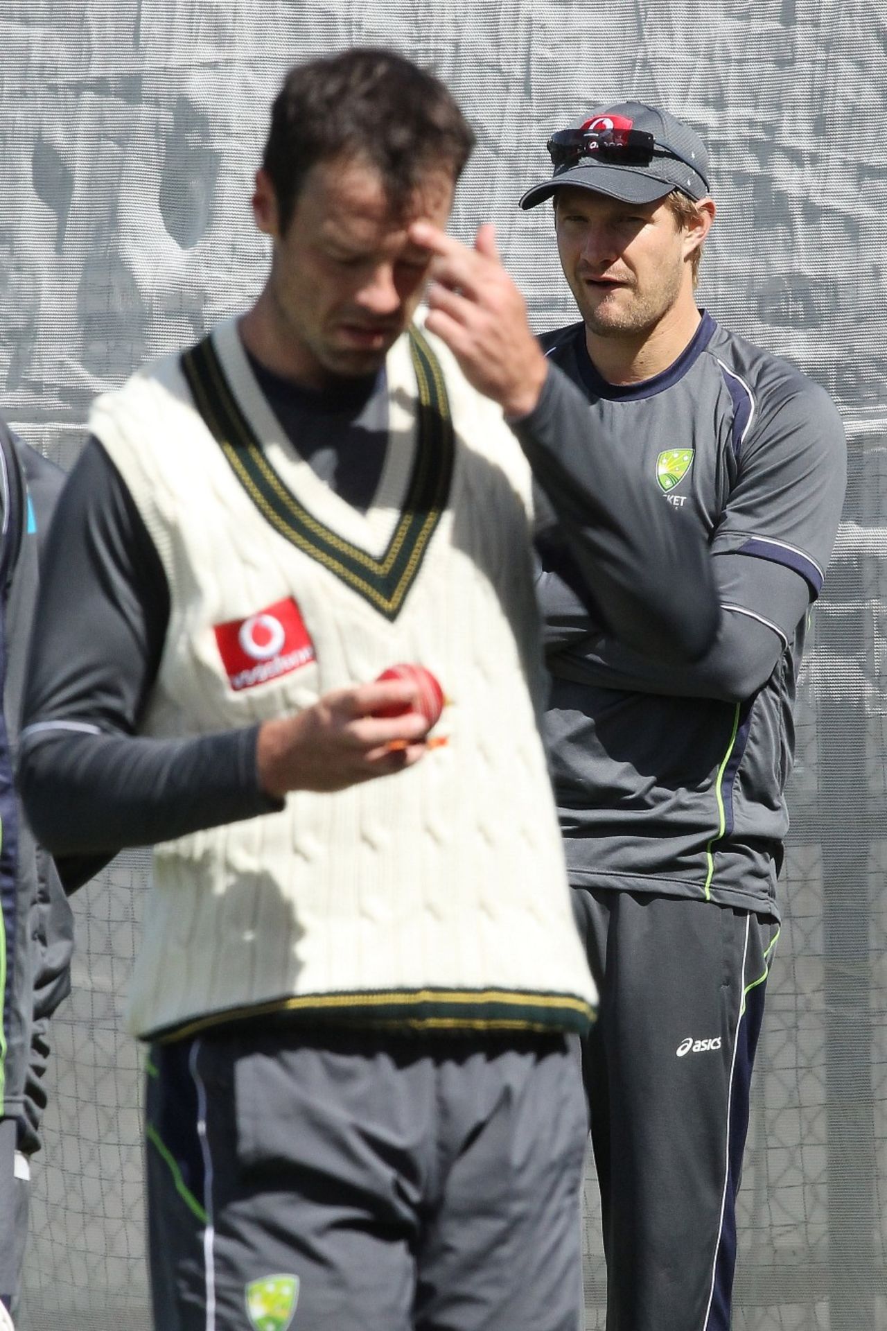 Shane Watson watches Rob Quiney at Australia's training session, Adelaide, November 21, 2012