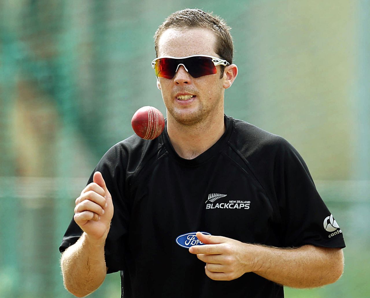 Todd Astle tosses the ball at practice, Colombo, November 23, 2012