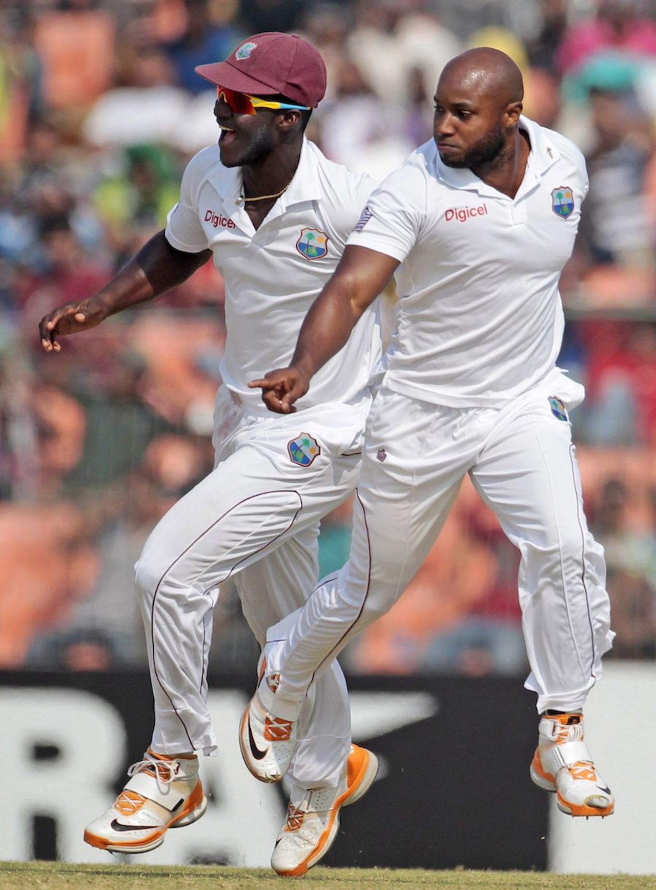 Tino Best and Darren Sammy celebrate a wicket, Bangladesh v West Indies, 2nd Test, Khulna, 4th day, November 24, 2012