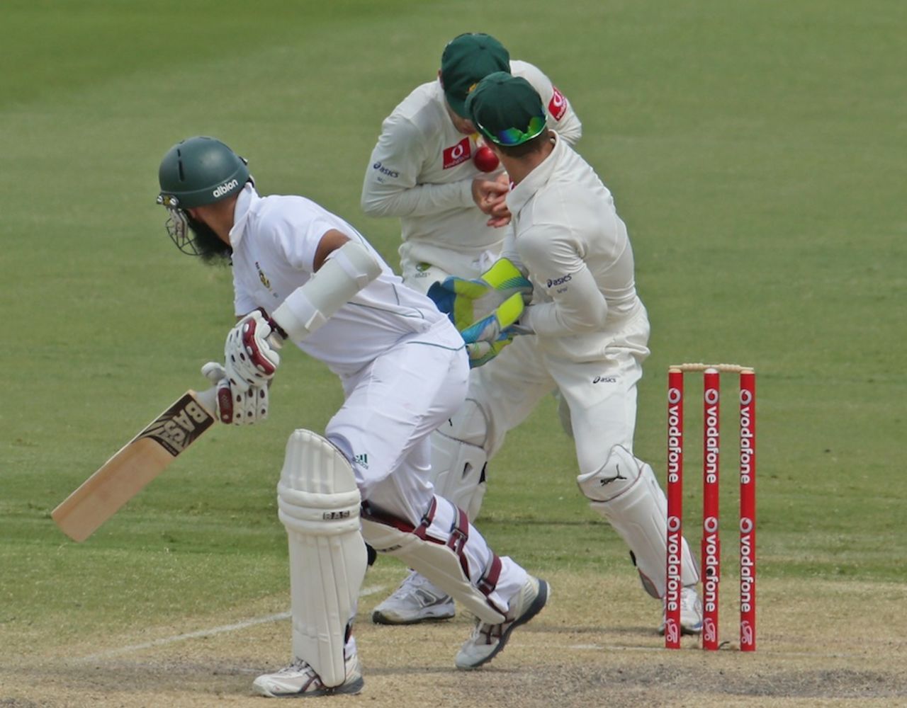 Hashim Amla was caught at slip after a juggle from Michael Clarke, Australia v South Africa, 2nd Test, Adelaide, 4th day, November 25, 2012