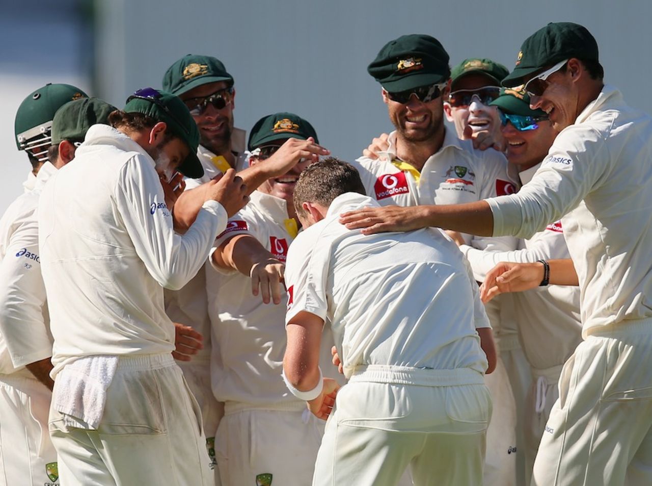 The Australians mob Peter Siddle after Dale Steyn's wicket, Australia v South Africa, 2nd Test, Adelaide, 5th day, November 26, 2012