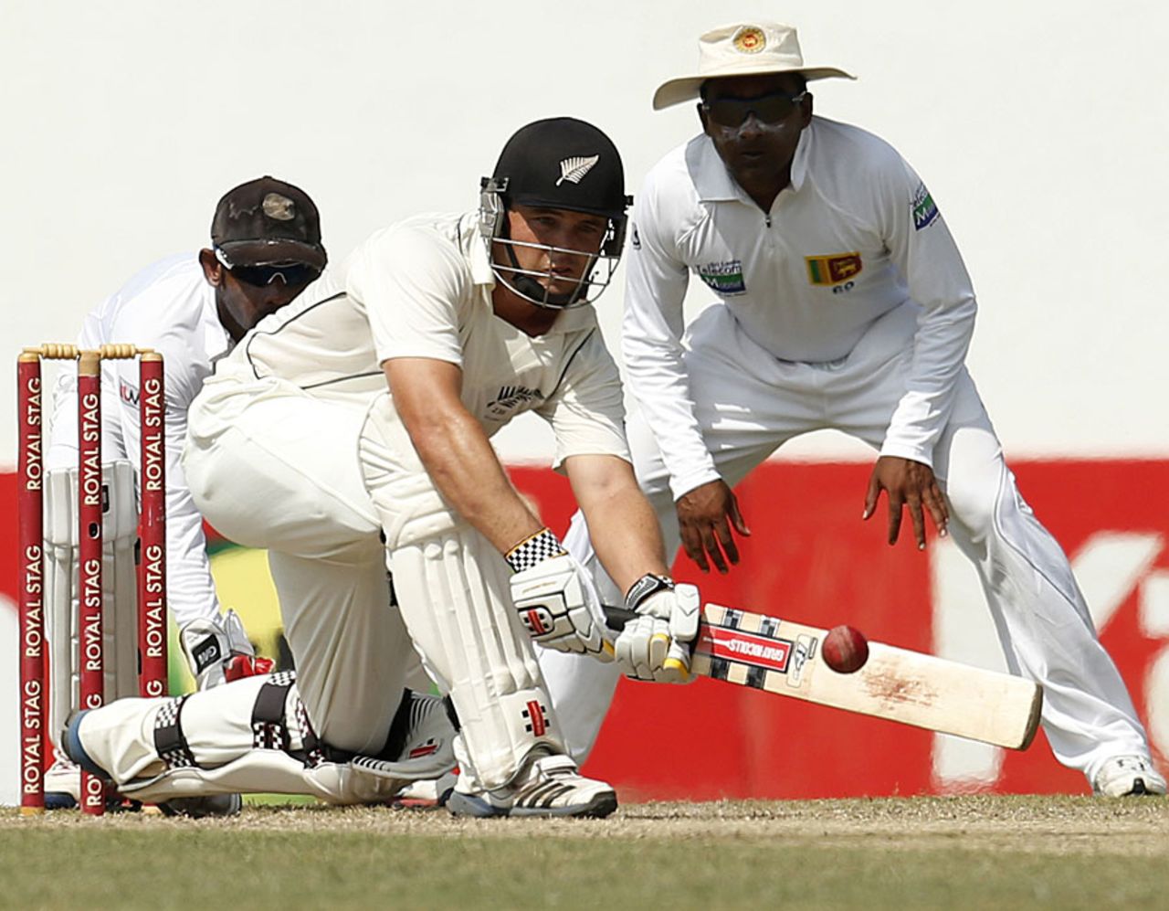 Daniel Flynn gets down to sweep, Sri Lanka v New Zealand, 2nd Test, Colombo, 2nd day, November 26, 2012