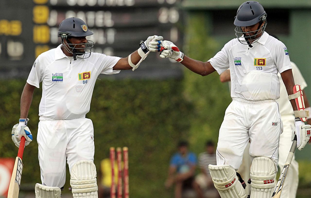 Thilan Samaraweera and Suraj Randiv punch gloves during their stand, Sri Lanka v New Zealand, 2nd Test, Colombo, 3rd day, November 27, 2012
