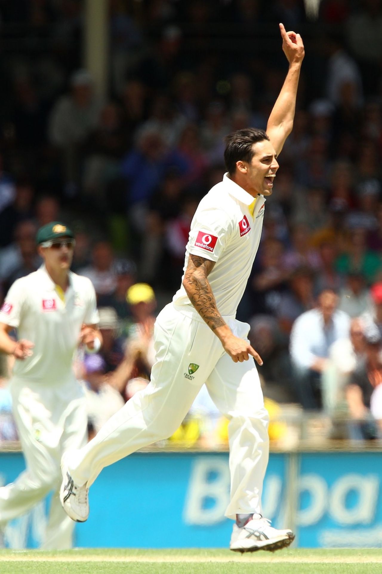 Mitchell Johnson celebrates a wicket on his return to the Test side, Australia v South Africa, 3rd Test, Perth, 1st day, November 30, 2012