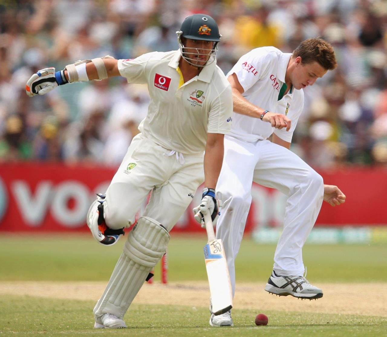James Pattinson runs past Morne Morkel, Australia v South Africa, 2nd Test, Adelaide, 4th day, November 25, 2012