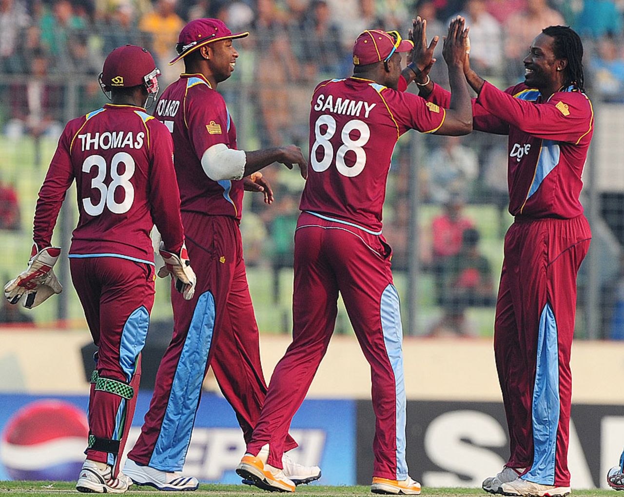 Chris Gayle and his team-mates celebrate a wicket, Bangladesh v West Indies, 3rd ODI, Mirpur, December 5, 2012