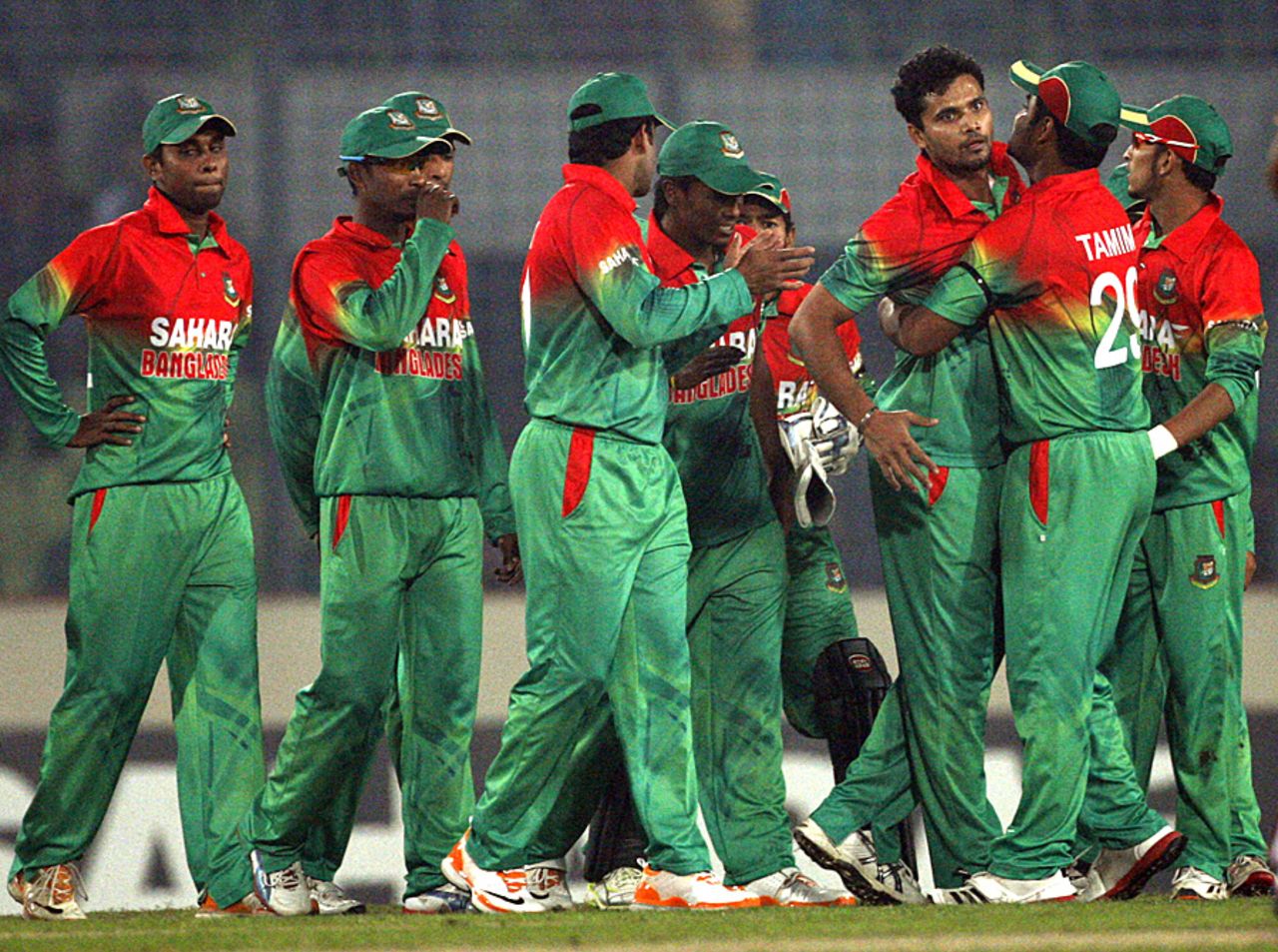 Mashrafe Mortaza is greeted by his team-mates after he dismissed Chris Gayle cheaply, Bangladesh v West Indies, 3rd ODI, Mirpur, December 5, 2012