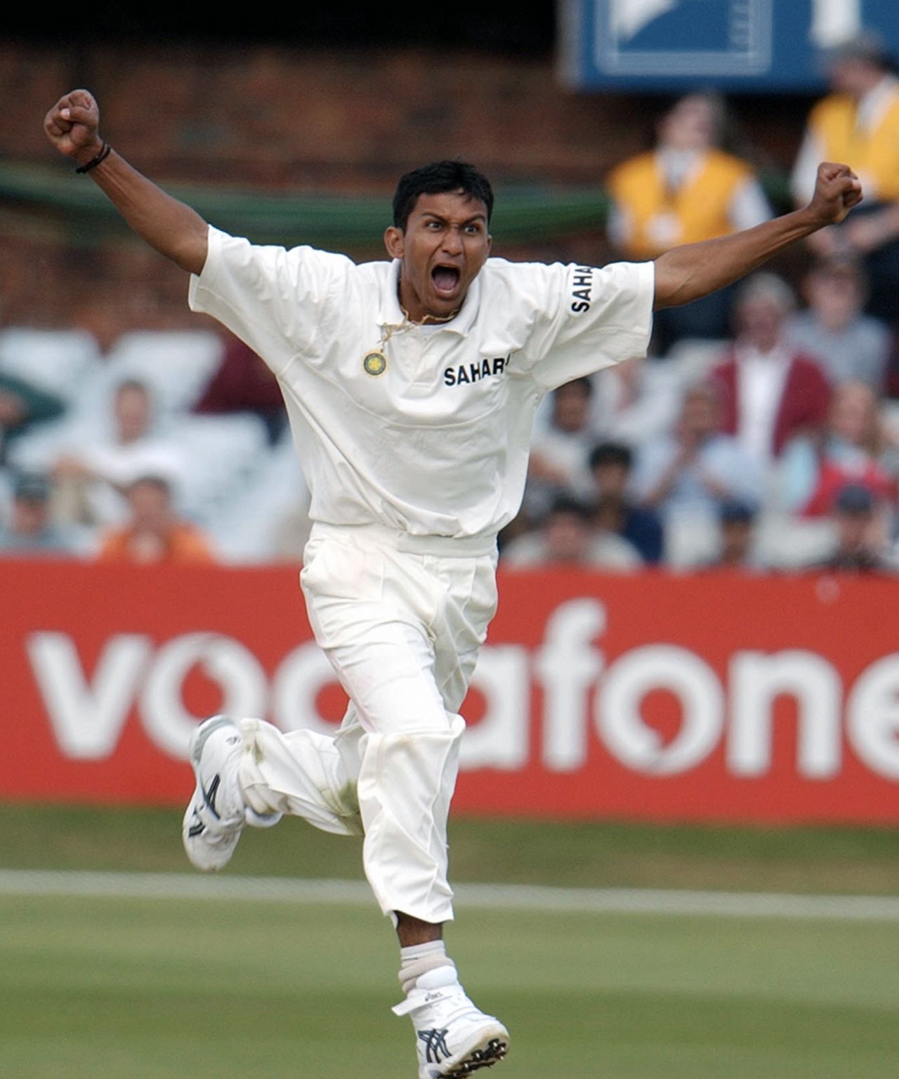 Sanjay Bangar celebrates Mark Butcher's wicket, England v India, 3rd Test, Headingley, 4th day, August 25, 2002
