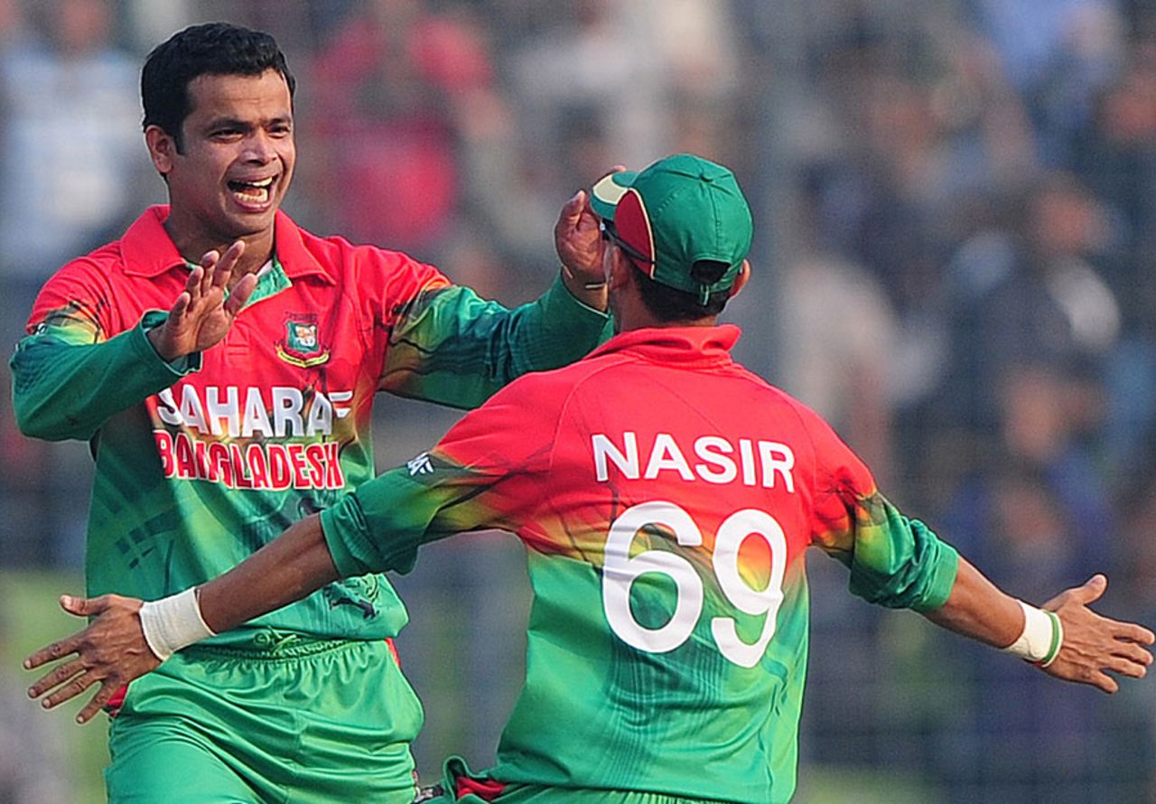 Abdur Razzak and Nasir Hossain celebrate an early strike, Bangladesh v West Indies, 4th ODI, Mirpur, December 7, 2012
