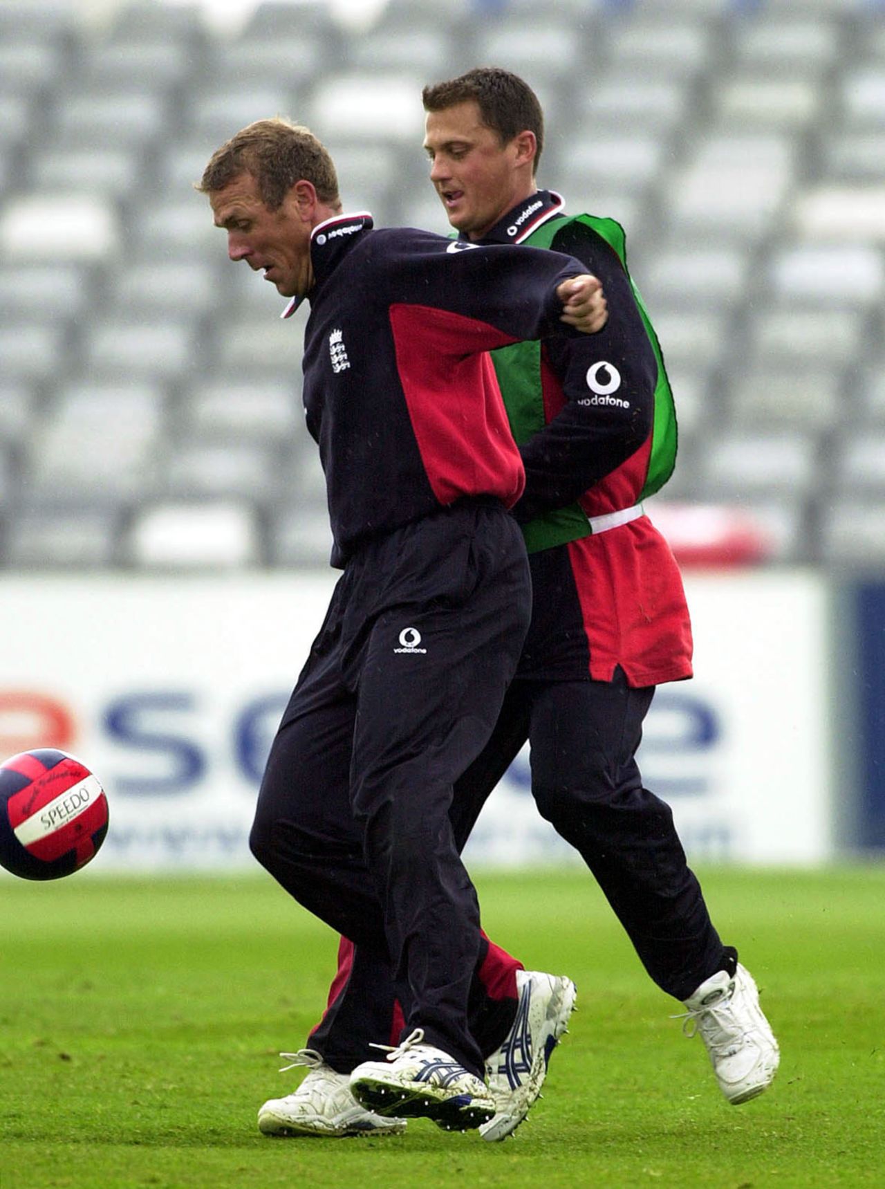 Alec Stewart and Darren Gough play football, Headingley, June 16, 2001