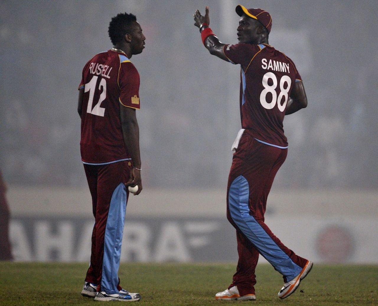 Darren Sammy has a word with Andre Russell, Bangladesh v West Indies, 5th ODI, Mirpur, December 8, 2012