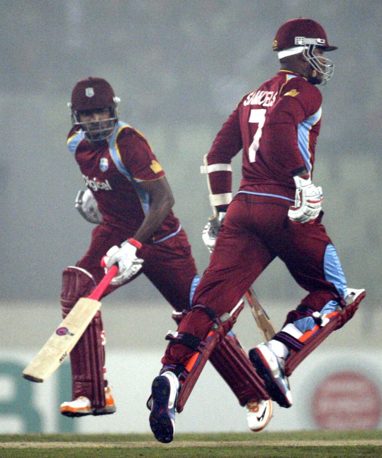 Marlon Samuels and Darren Bravo run between the wickets, Bangladesh v West Indies, only Twenty20, Mirpur, December 10, 2011