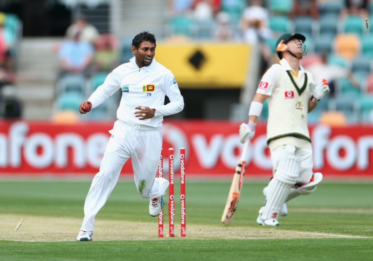 David Warner is run out for 57, Australia v Sri Lanka, 1st Test, Hobart, 1st day, December 14, 2012