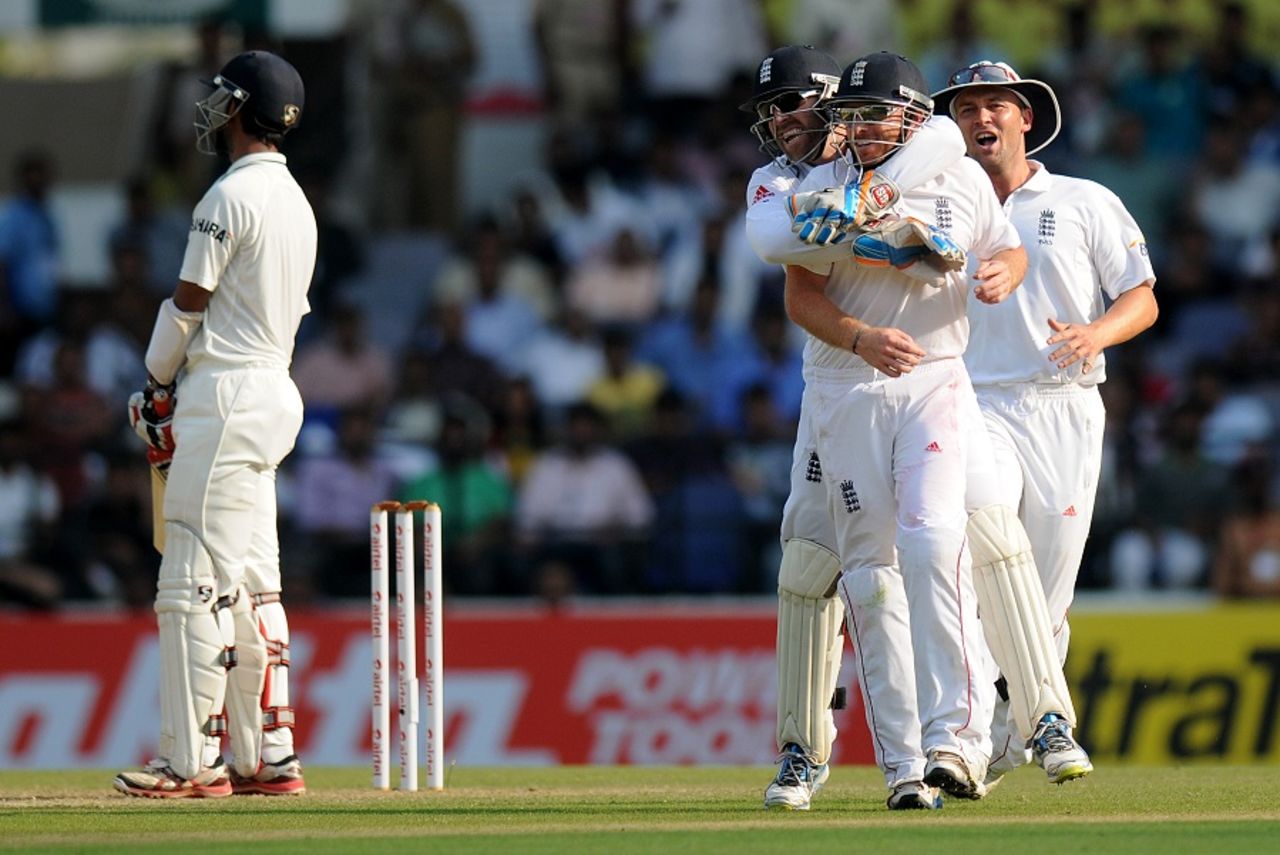 England celebrate Ian Bell's catch to dismiss Cheteshwar Pujara, India v England, 4th Test, Nagpur, 2nd day, December 14, 2012