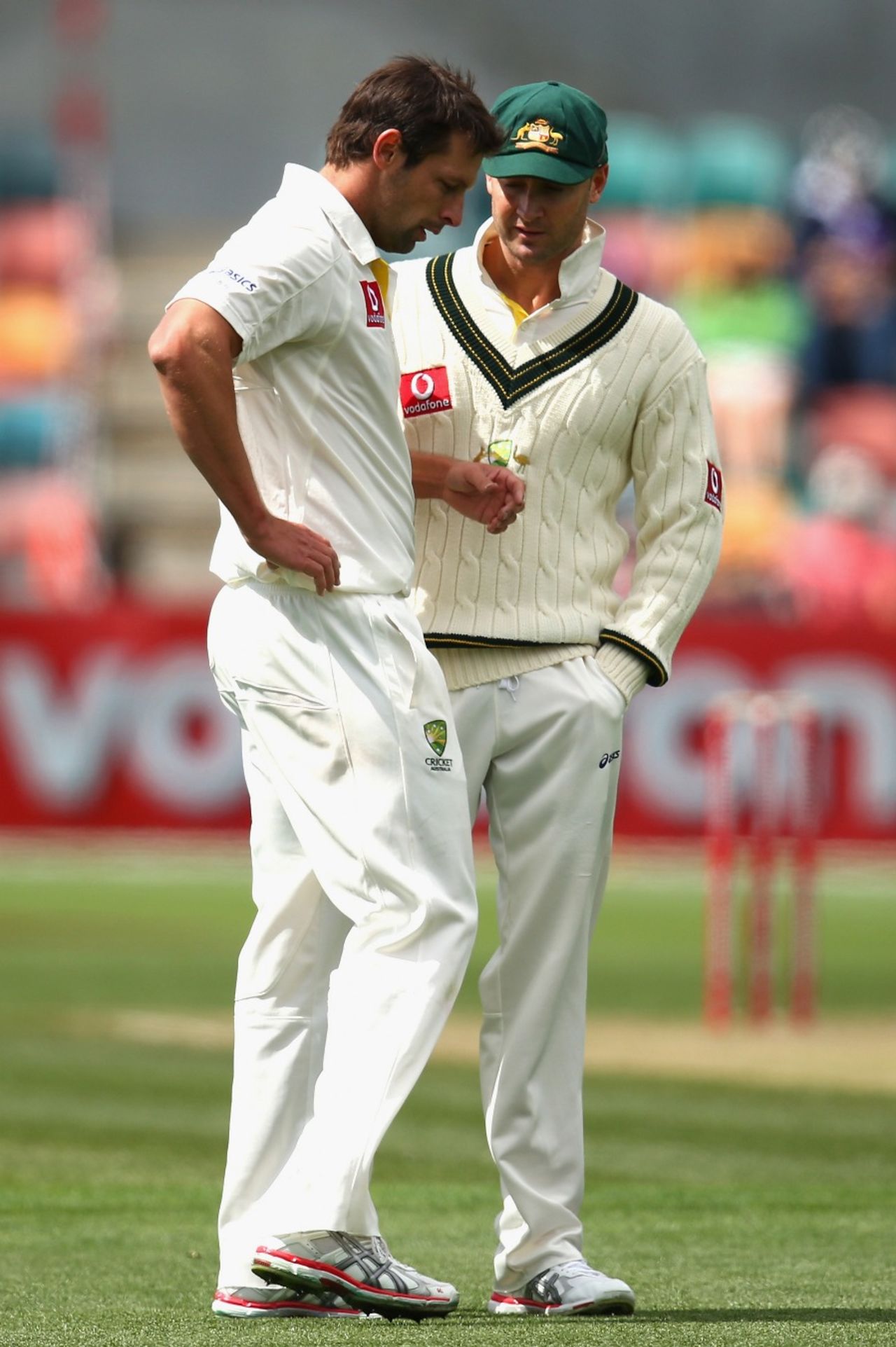Michael Clarke checks on the injured Ben Hilfenhaus, Australia v Sri Lanka, 1st Test, Hobart, 3rd day, December 16, 2012