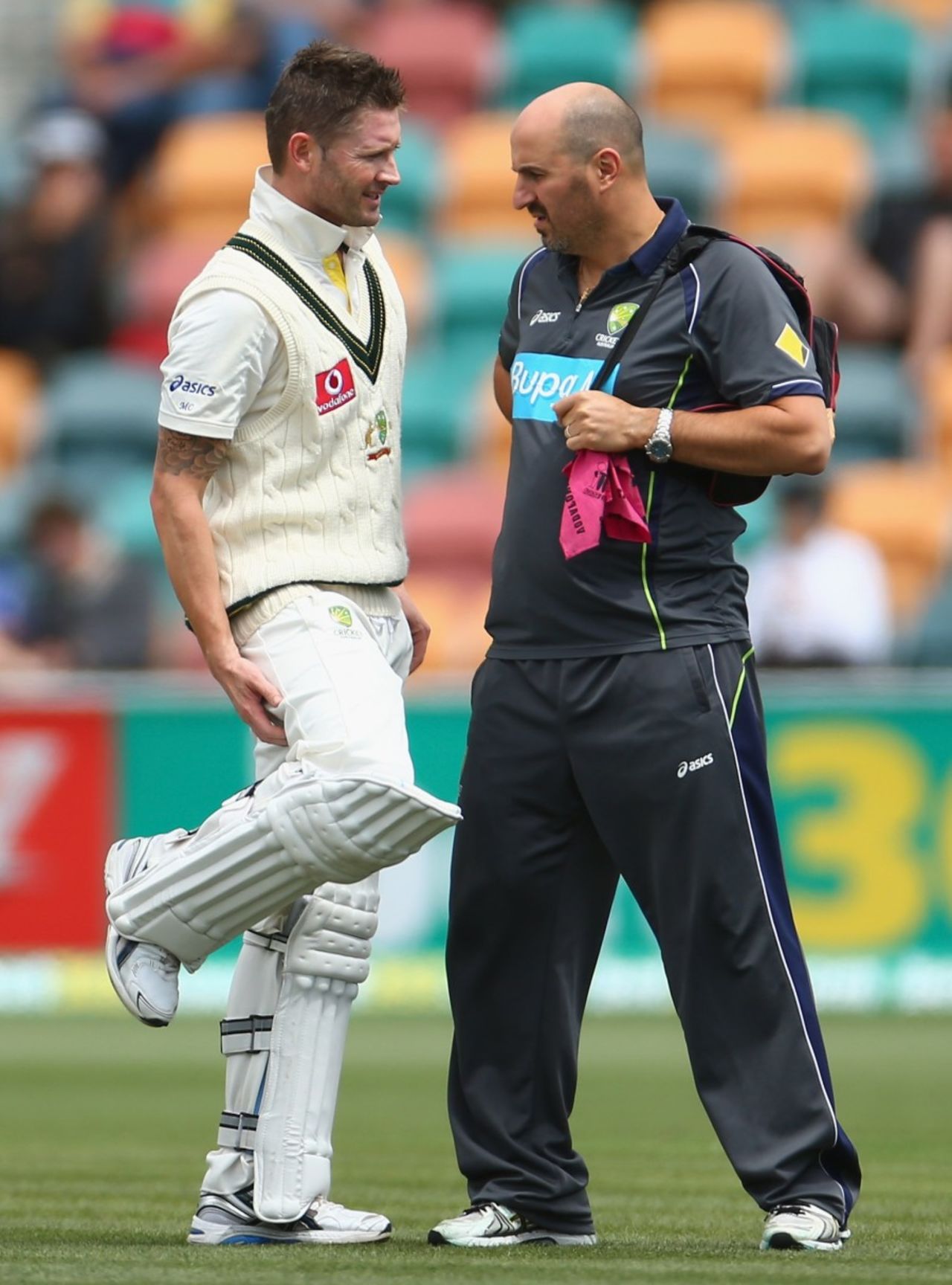 Michael Clarke speaks to physio Alex Kountouris about his injured right hamstring, Australia v Sri Lanka, 1st Test, Hobart, 4th day, December 17, 2012