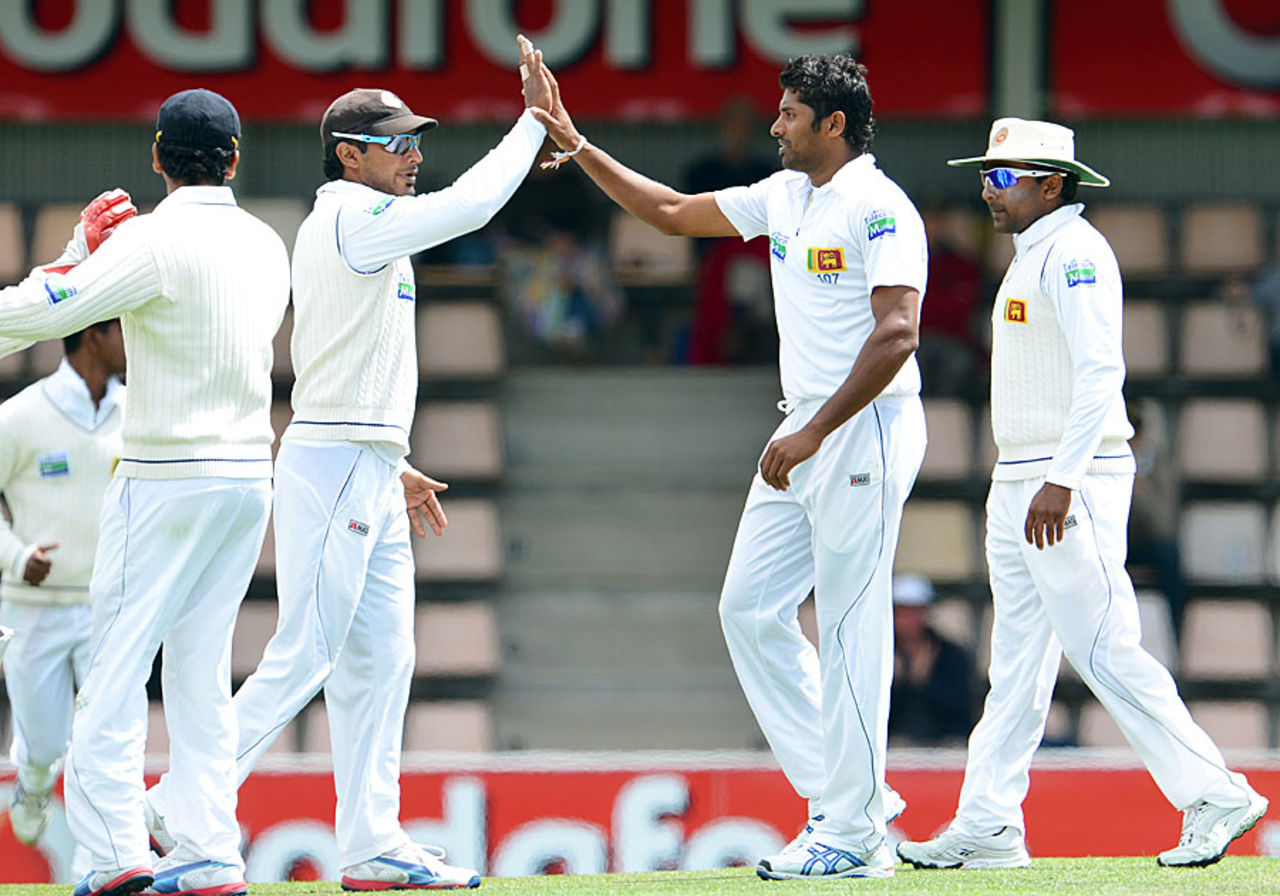 Chanaka Welegedara is congratulated for taking a wicket, Australia v Sri Lanka, 1st Test, Hobart, 4th day, December 17, 2012