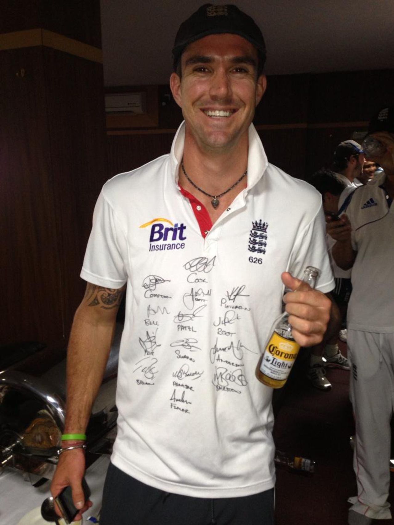 Kevin Pietersen, with his England shirt signed by team-mates, celebrates the series win, India v England, 4th Test, Nagpur, 5th day, December 17, 2012