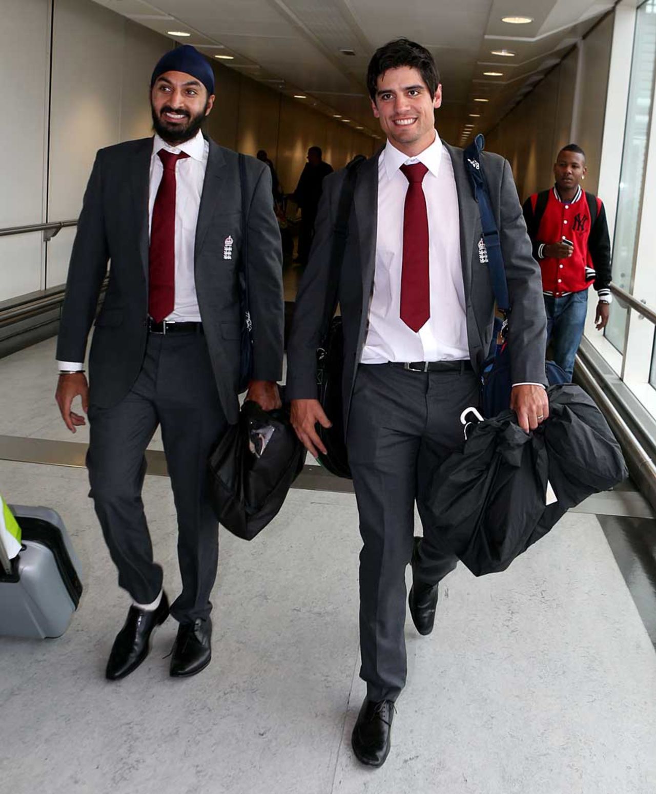 Monty Panesar and Alastair Cook arrive home, London, December 18, 2012