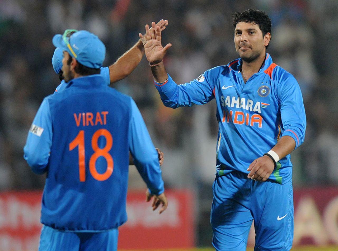 Yuvraj Singh claimed three wickets, India v England, 1st T20, Pune, December 20, 2012
