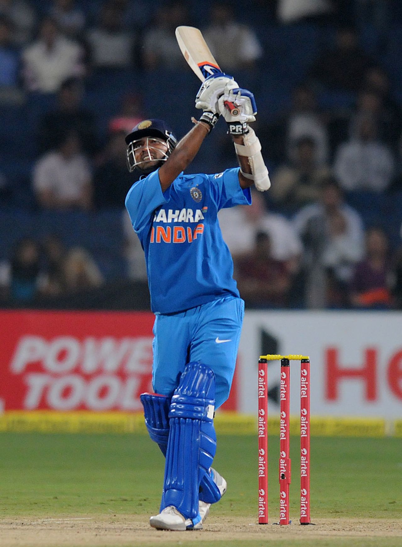 Ajinkya Rahane launches a straight six, India v England, 1st T20, Pune, December 20, 2012